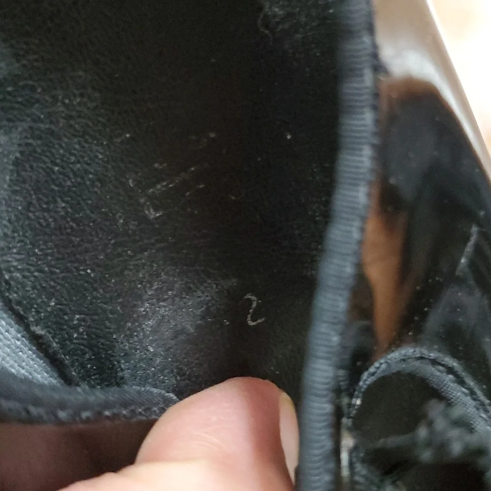 Black patent tap dance shoes